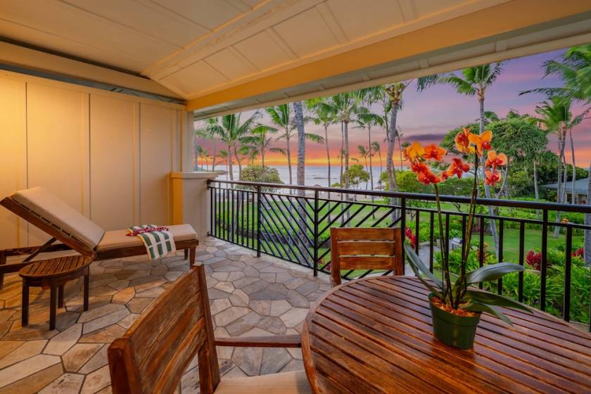 Vacation rental balcony with garden and ocean views